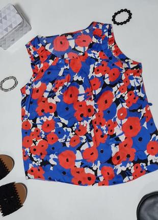 Стильна блуза з квітковим принтом за будь-який донат