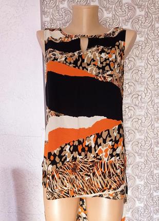 Подовжена футболка від бренда star.