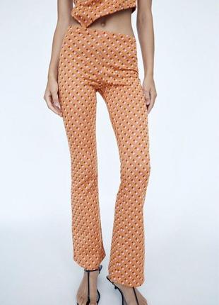 Яркие брюки брюки штаны клеш орнамент разноцветные оранжевые оранжевые zara зара1 фото