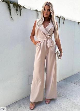 Комбинезон женский брючный красивый эффектный деловой стильный на лето с расклешенными брюками размеры 42-485 фото