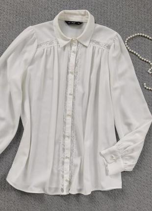 Блузка белая с объемным рукавом