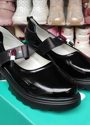 Черные туфли на платформе школьные с резинкой8 фото