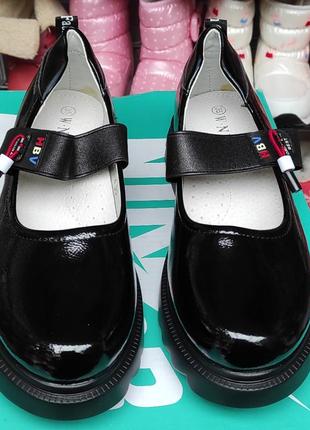 Черные туфли на платформе школьные с резинкой10 фото