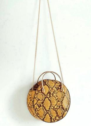 Mango нова стильна кругла жіноча сумка в руках або через плече рептилія манго