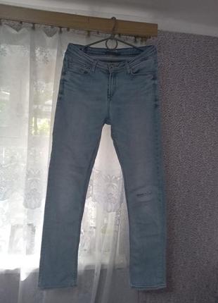 Стрейчевые фирменные женские джинсы,48 г. примерно