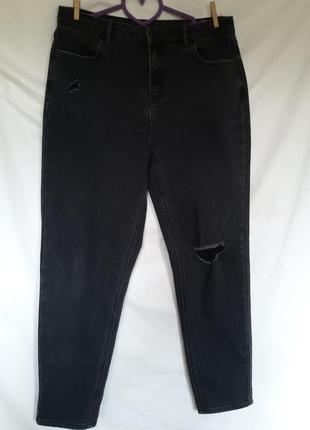 Жіночі рвані стрейчові графітові джинси мом з потертостями1 фото