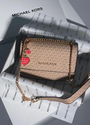 Женская стильная бежевая сумка  michael kors тренд сезона