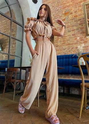 Костюм брючний топ на гумці з рюшечкою рукав спущений короткий ліхтарик штани широкі вільні талія на гумці бічні кишені тканина креп жатка