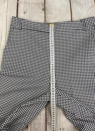 Брюки брюки женские в клетку с карманами черно- белого цвета primark6 фото
