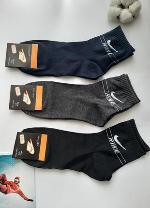 Шкарпетки чоловічі спортивні з брендовим значком різні кольори3 фото