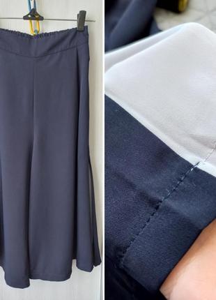 Корея юбка - брюки с карманами и боковыми скдадками.3 фото