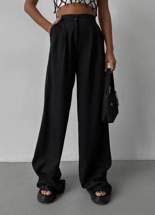 Классические женские брюки палаццо длинные на высокой посадке стильные широкие брюки клеш от бедра черные бежевые3 фото