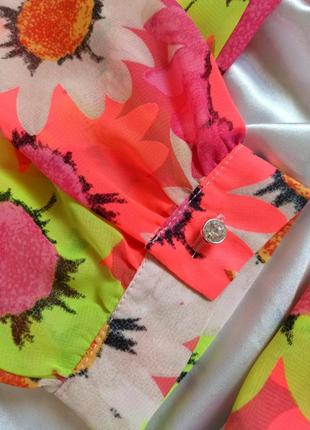 Яскрава шифонова блузка в квіти оранжева рожева6 фото