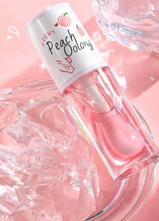 Бальзам-олійка для губ з екстрактом персика bobeini peach oolong1 фото