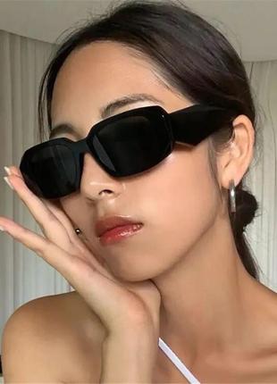 Стильные женские солнцезащитные очки в черном цвете в стиле прада10 фото