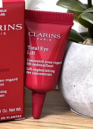 Оригинальный восстанавливающий концентрат для кожи вокруг глаз clarins total eye lift оригинал концентрат для глаз2 фото