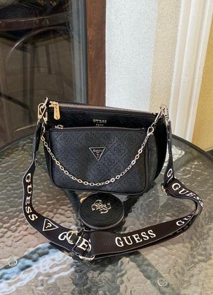 Сумочка від guess pochette multi black