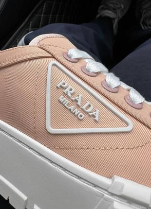 Prada double wheel nylon gabardine premium
жіночі масивні кеди персикові висока платформа літо весна массивные персиковые кеды высокая подошва бренд4 фото