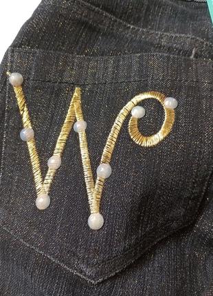 Фирменные новые джинсы 👖 с золотистой нитью вышивкой10 фото