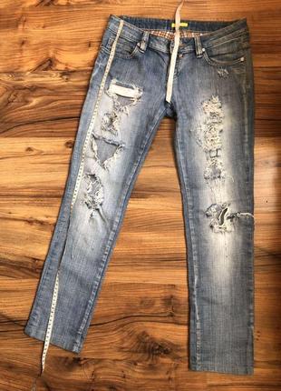 Стильні рвані джинси6 фото