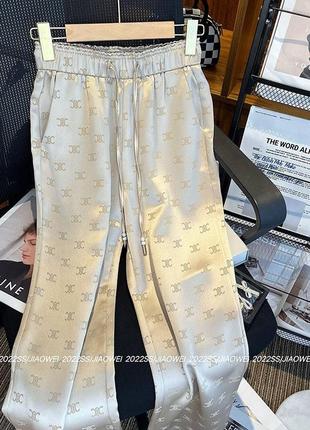 Шовкові штани брюки палаццо з оксамитовим напиленням стильні трендові штани