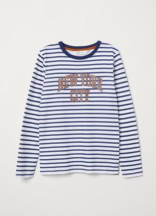 Новый стильный реглан для мальчика. h&m.
размер 8-10 лет1 фото