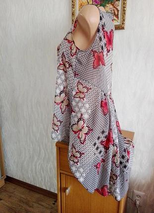 Блузка сзади длиннее