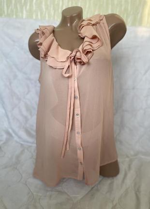 Полупрозора блуза з рюшами