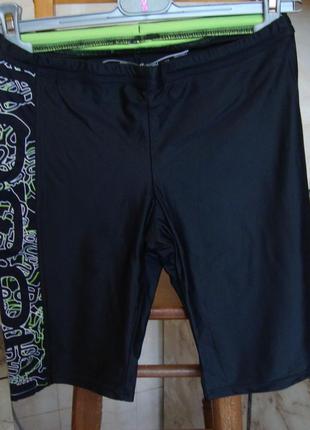 Спортивные шорты черные лосины с цветной полоской  nabaiji