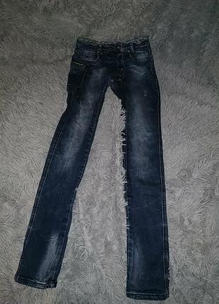Стильні джинси оригінальному крою1 фото