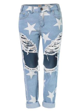 Рвані блакитні джинси із зірками1 фото