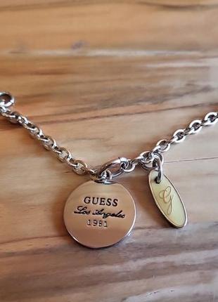 Подвеска украшение на сумку guess1 фото