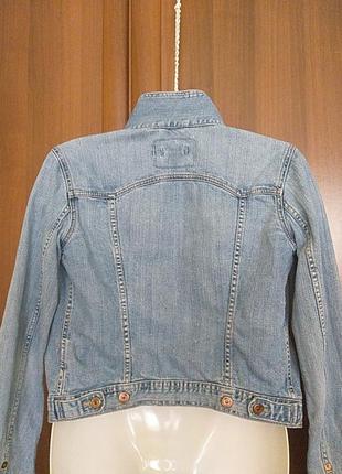 Укороченая джинсовая куртка.2 фото