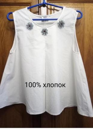 Біла брендова блузка zara trafaluc (оригінал)трапеція  з декором брошки (ньюанс)