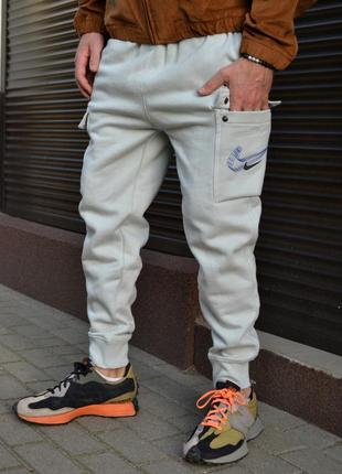 Мужские брюки nike pant cargo air print5 фото