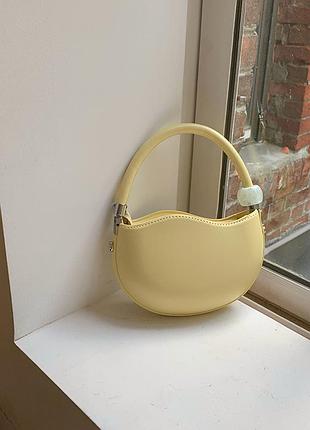 Сумка світло жовта крос-боді на руку округла