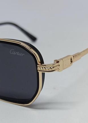 Cartier очки унисекс солнцезащитные узкие черные однотонные в золотом металле3 фото
