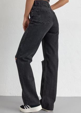 Жіночі джинси з рваними колінами6 фото