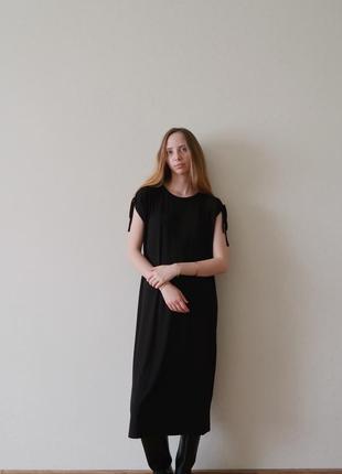 Чорна сукня довжини міді4 фото