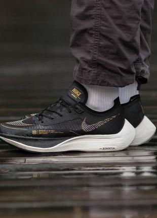 Кроссовки nike zoomx black gold2 фото