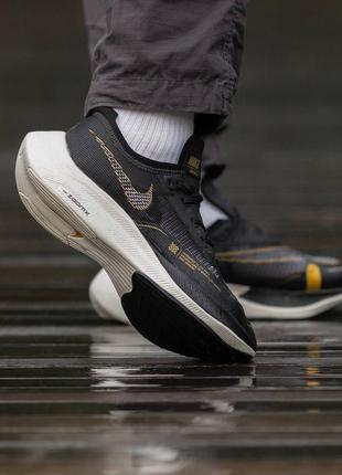 Кроссовки nike zoomx black gold5 фото