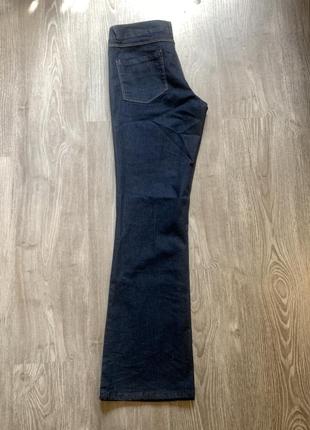 Нові сині джинси кльош від коліна2 фото