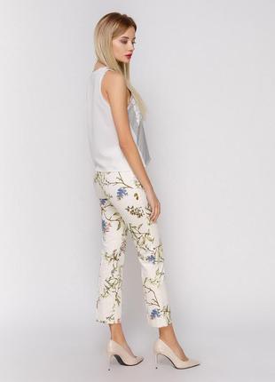 Укороченные брюки с цветочным принтом zara2 фото