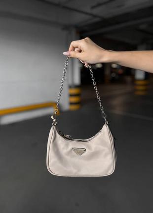 Женская сумка prada re-edition mini beige2 фото