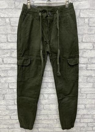 Чоловічі камуфлячі зелені хаки джинси джокери на гумці1 фото