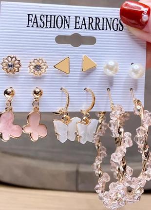 Модні сережки-кільці та сережки-цвяшки з імітацією перлів 6 пар у золотому кольорі.