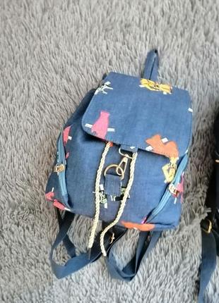 Джинсовый рюкзак с разными принтами2 фото