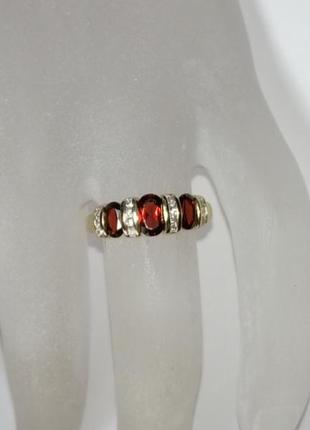 Золотое кольцо с гранатами и бриллиантами 0,16 карат 17,5 мм. желтое золото. новое2 фото