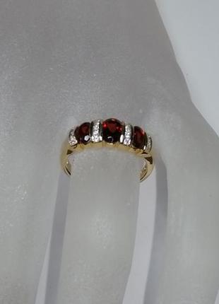 Золотое кольцо с гранатами и бриллиантами 0,16 карат 17,5 мм. желтое золото. новое3 фото