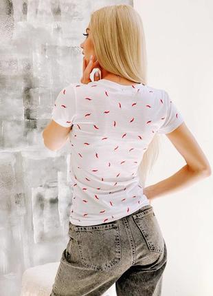 Молодіжна жіноча футболка з малюнком 42 розмір2 фото